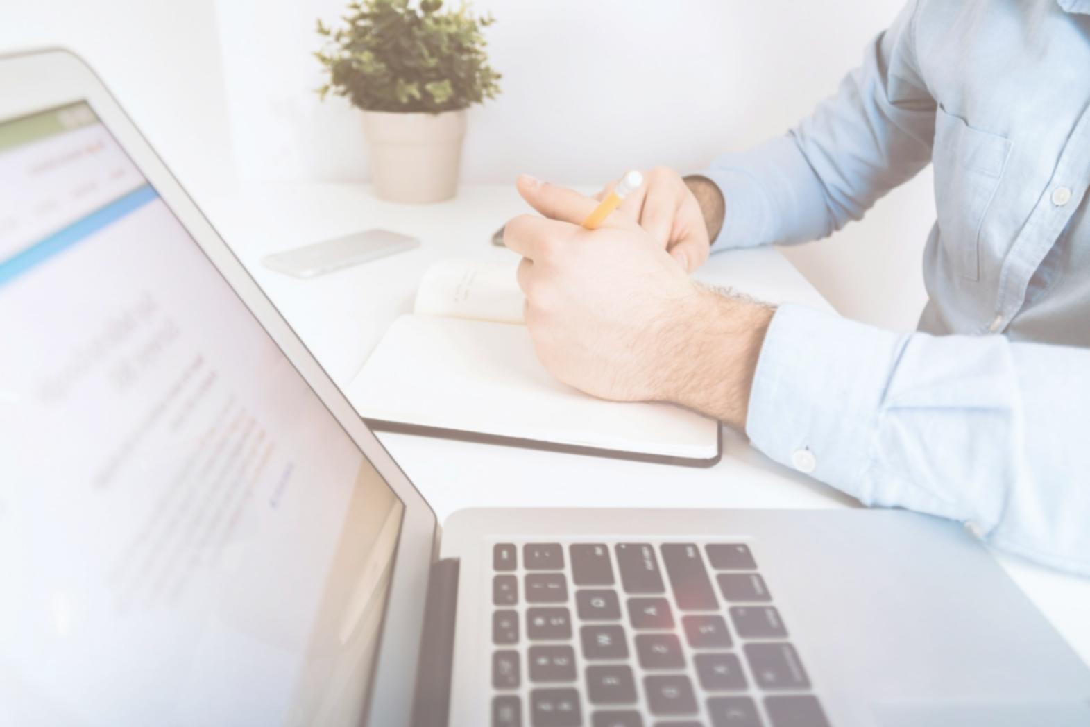 Students working on mobile app testing projects in modern learning environment